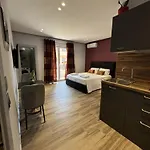 55 * Tirana